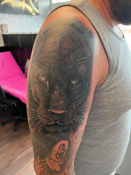 Half Sleeve Panther Tattoo