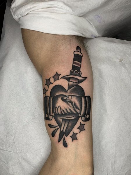 Heart And Dagger Tattoos