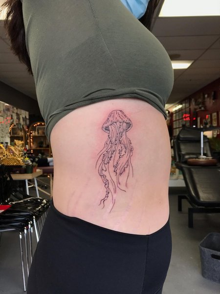 Jellyfish Tattoo On Rib Cage