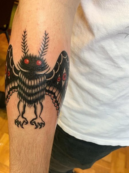Mothman Tattoo On Arm
