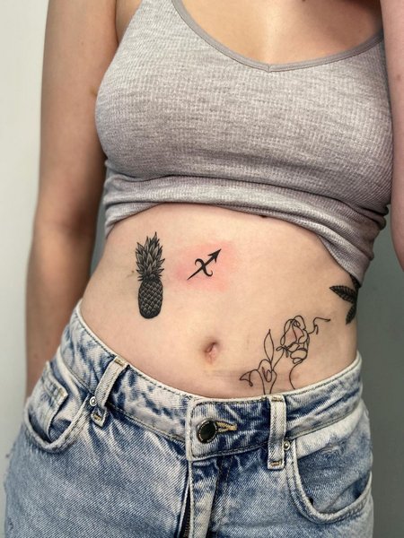 Female Tattoos On Stomach