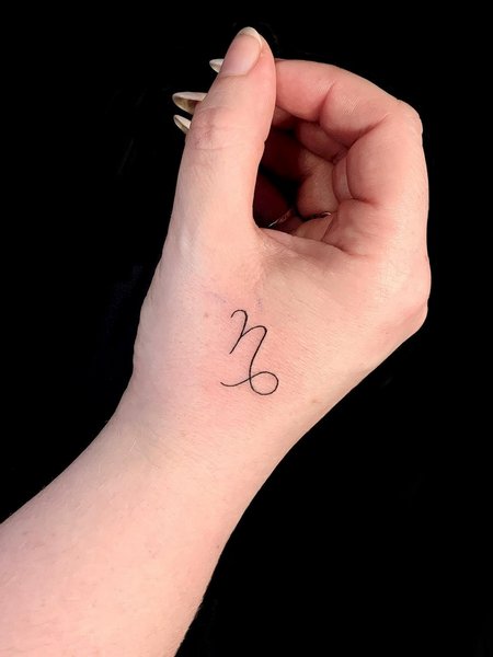 Capricorn Hand Tattoo