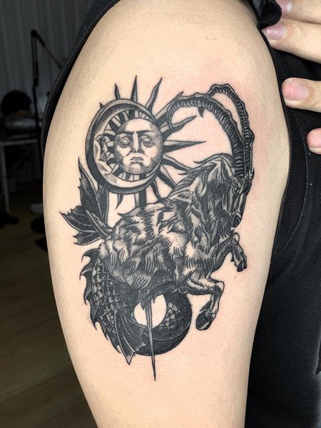 Capricorn Sun And Moon Tattoo