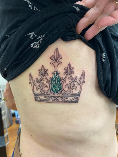 Crown Rib Cage Tattoo