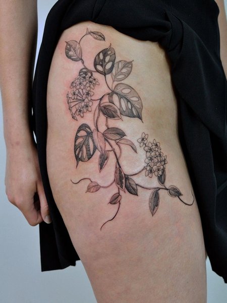 Plant Thigh Tattoo