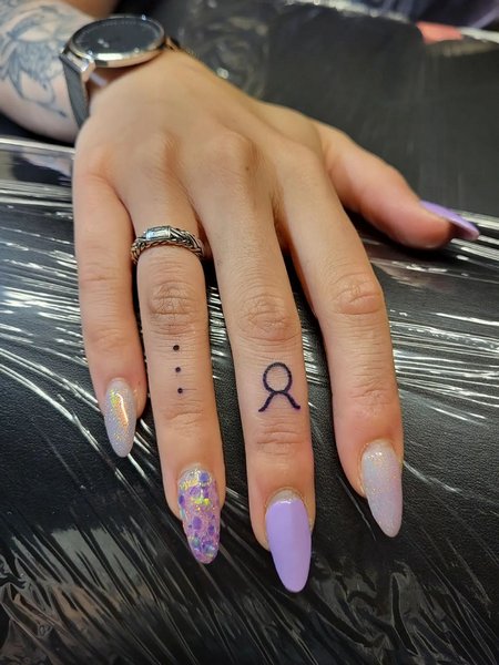 Taurus Finger Tattoo