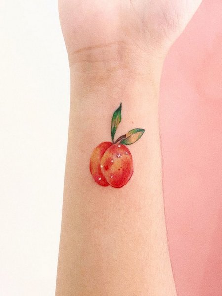 Peach Wrist Tattoo